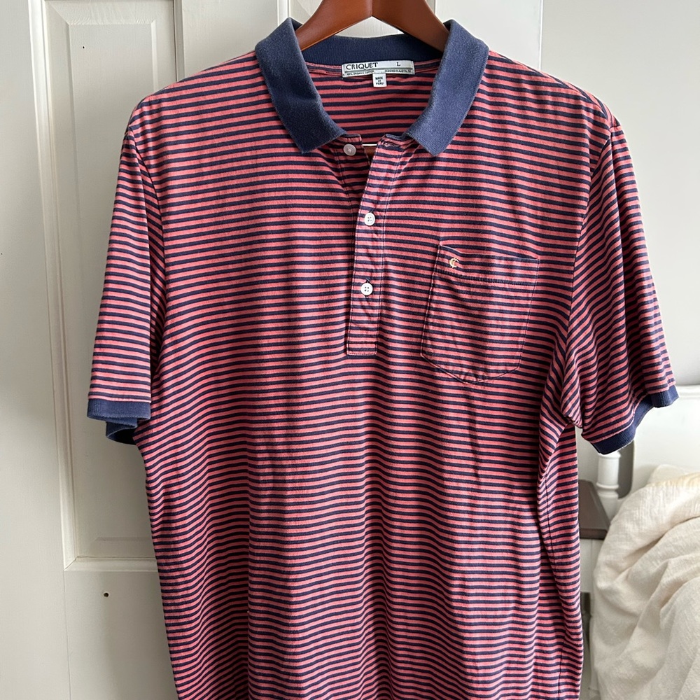 Criquet coral and navy striped polo